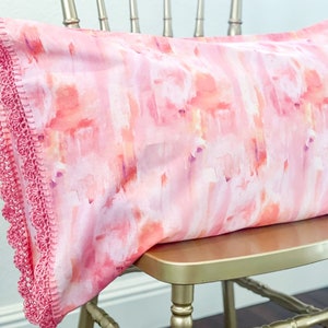 Handmade crochet trim pink pillowcase; pink and orange organic crocheted knit edge with European closure. Crocheted Pillow case sham