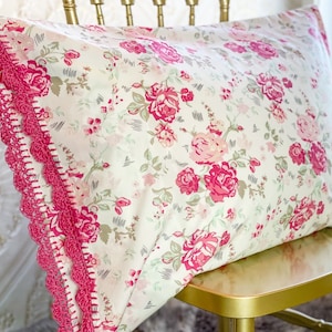 Handmade crochet trim floral pillowcase, pink & aqua blue flower fabric; bright pink crocheted edge. Pretty vintage look pillow case sham