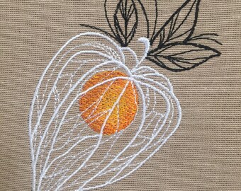 May include: Embroidered design of a white lantern plant with an orange center and black leaves.