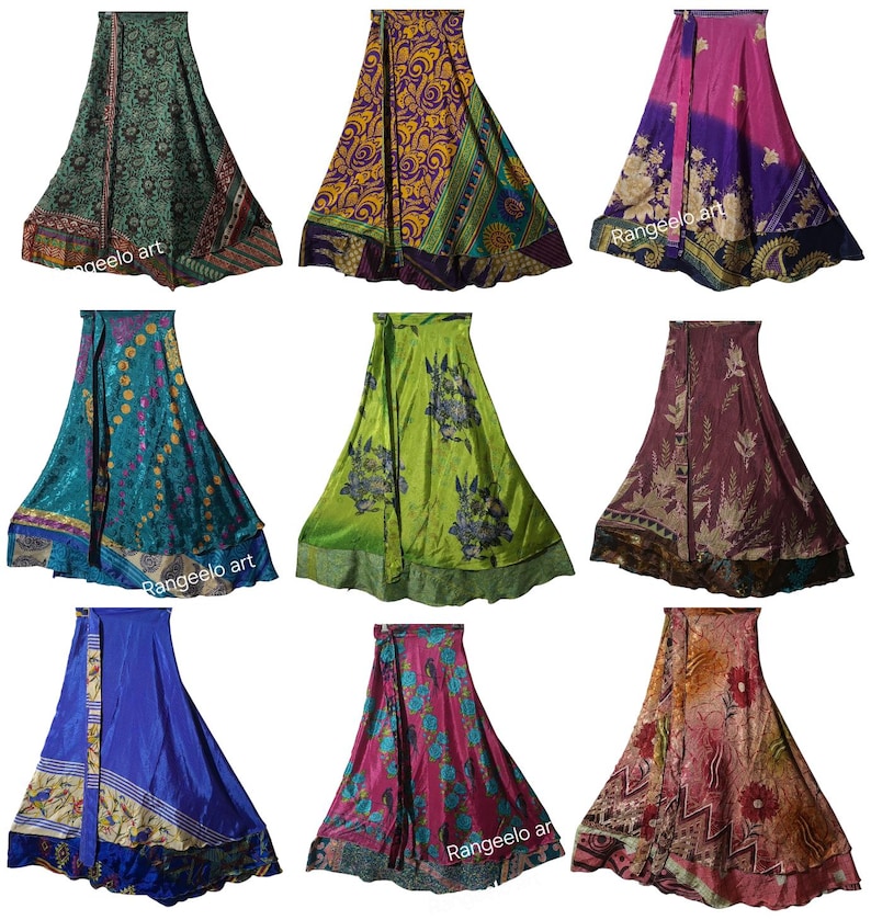 May include: Nine colorful wrap skirts with various patterns and designs are displayed. The skirts feature a range of colors, including green, purple, blue, and pink. Some skirts have floral patterns, while others have geometric or abstract designs. The skirts are made of a silky material.