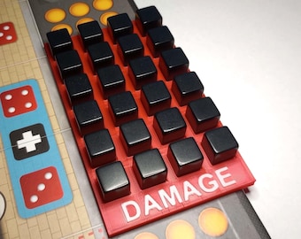 May include: A red and black damage tracker with 20 black square tokens. The tracker has the word "DAMAGE" printed in white letters.