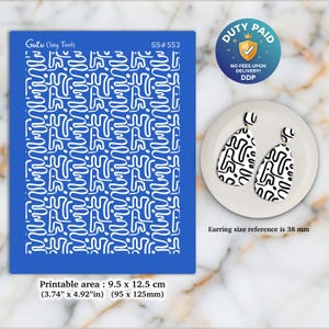 May include: A blue stencil with a white abstract pattern, next to a pair of black and white earrings. The stencil is labeled "Goto Clay Tools" and "SS#553". The earrings are teardrop-shaped, with a black abstract design. The printable area is 9.5 cm x 12.5 cm.