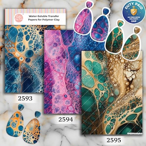 May include: Three sheets of water-soluble transfer paper for polymer clay labeled 2593, 2594, and 2595. The sheets feature abstract fluid acrylic paint patterns in blue and gold, pink and purple, and teal and beige. Four pairs of teardrop earrings.