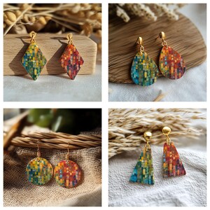 May include: A collection of four pairs of dangle earrings featuring various geometric shapes including diamonds, teardrops, circles, and trapezoids. Each earring displays a vibrant mosaic pattern of small multicolored squares in shades of blue, green, yellow, orange, and red, suspended from gold-toned metal hooks.
