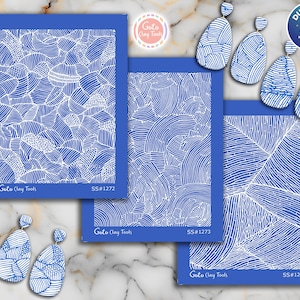 May include: Blue and white clay tools with various patterned designs, including curved lines and geometric shapes. The image also shows matching blue and white earrings. The text on the tools reads "Goto Clay Tools" and includes the product numbers SS#1272, SS#1273, and SS#1274.