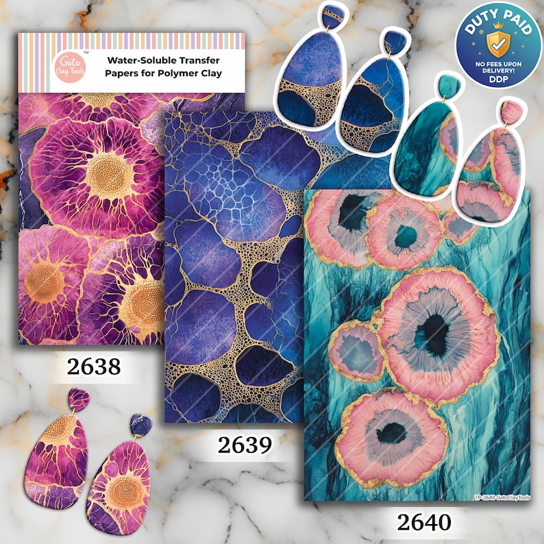 May include: Three sheets of water-soluble transfer paper for polymer clay labeled 2638, 2639, and 2640. The sheets feature abstract patterns in purple, blue, and teal with gold veining. Four teardrop-shaped earrings display matching designs.