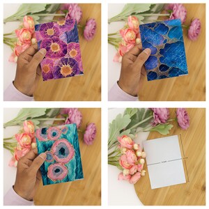 May include: A set of three rectangular cards featuring abstract agate-inspired patterns in purple, blue, and teal with gold veining. One card is blank white with a visible measurement line indicating a 4-inch width and 6-inch height.