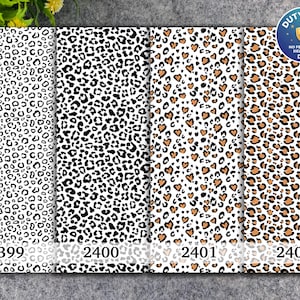 Puede incluir: Cuatro paneles verticales con distintos estampados de animales. El panel 2399 muestra pequeñas manchas negras sobre blanco. El panel 2400 muestra densas manchas de leopardo negras. El panel 2401 presenta manchas de leopardo marrones en forma de corazón.