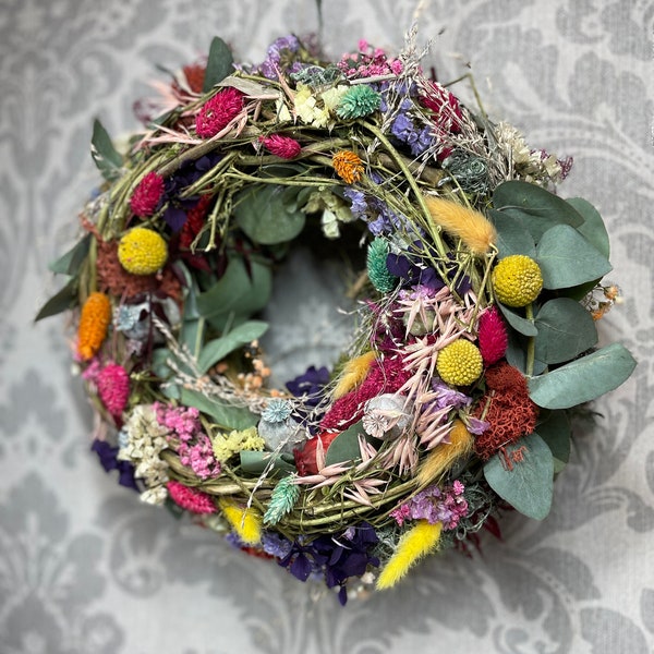 Dried flower wreath, brightly colored - ideal decoration for any door or as a table decoration in spring and a creative gift idea for a birthday