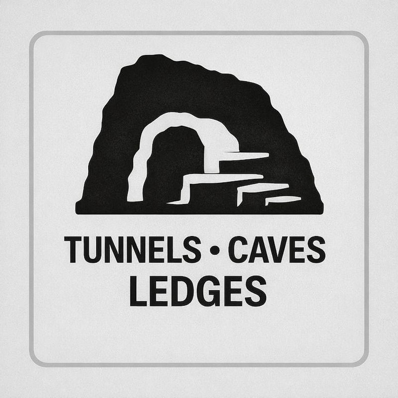 May include: A square sign with a black and white graphic of a cave entrance and steps. The words TUNNELS &bull; CAVES LEDGES are printed in black below the graphic on a white background.
