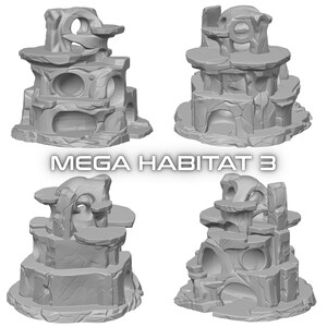 May include: Four gray, multi-level structures with archways, platforms, and circular openings. The structures are labeled "MEGA HABITAT 3". The design suggests a habitat or play structure, possibly for small pets or reptiles.