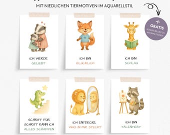 May include: Set of six affirmation cards for children with watercolor animal illustrations. Each card features a different animal and a positive affirmation in German. The cards are taped to a white background. The text "40 Affirmationskarten für Kinder" is at the top.