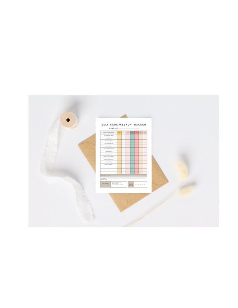 May include: A printable self-care weekly tracker with a light brown background. The tracker includes a list of self-care activities and a grid for tracking daily progress. The tracker is titled "Self-Care Weekly Tracker" and includes the text "Week of" at the top.