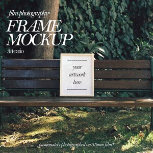 May include: A wooden bench with a white frame on top. The frame has the text "your artwork here" inside. The bench is in a park setting with green grass and trees in the background. The text "film photography* FRAME MOCKUP 3:4 ratio passionately photographed on 35mm film*" is visible at the top and bottom of the image.