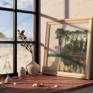 May include: A framed painting depicting a landscape with trees and a river, resting on a wooden windowsill. Two white ceramic vases and seashells are also on the windowsill. The window is open, revealing a view of a beach with people.