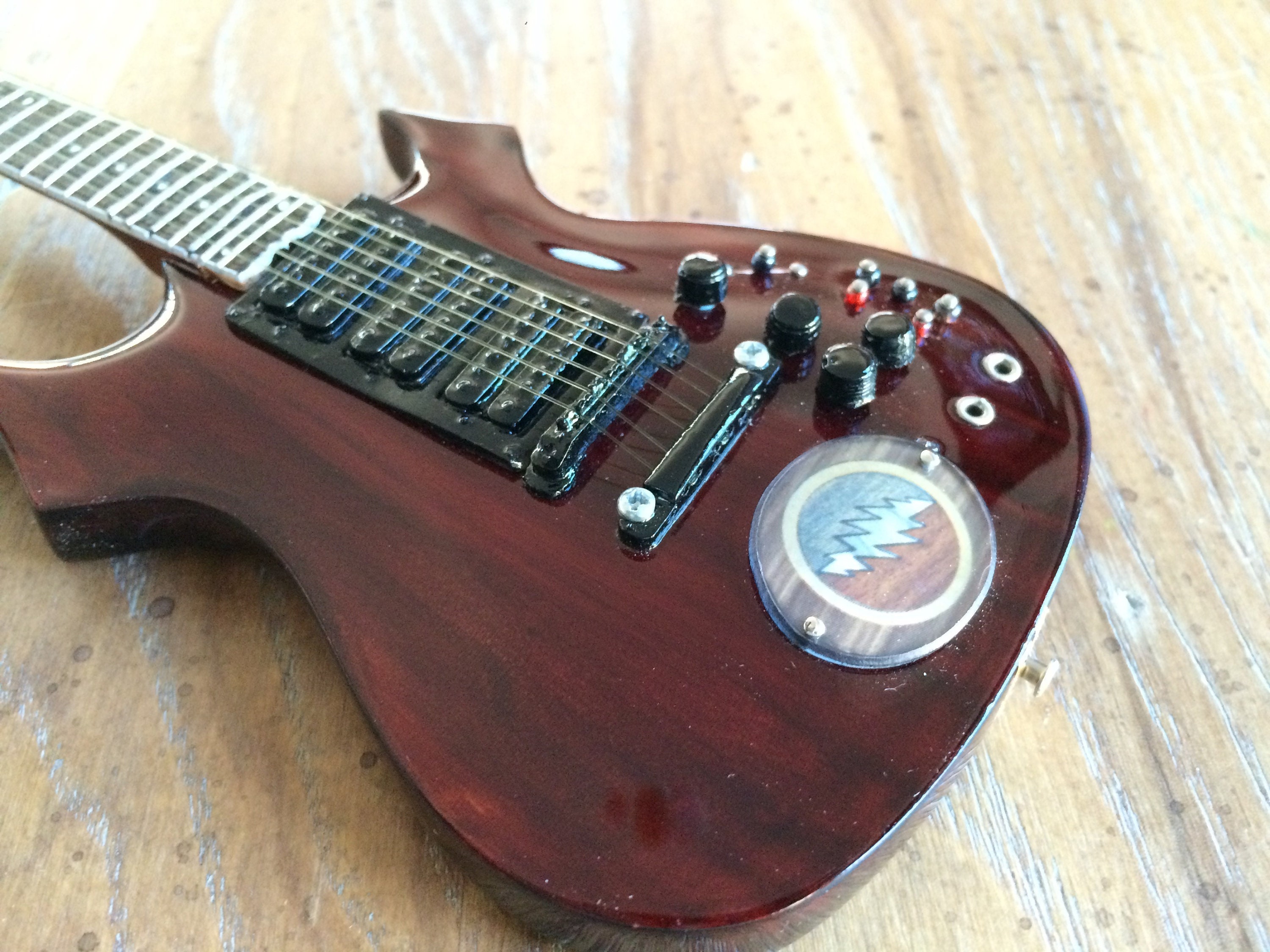 Jerry Garcia™ Lightning Bolt Tribute Mini Guitar Replica