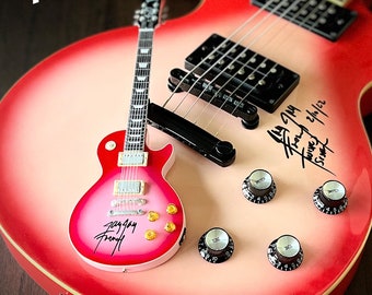 本物のサイン入りジェイジェイフレンチミニギター - ツイステッド