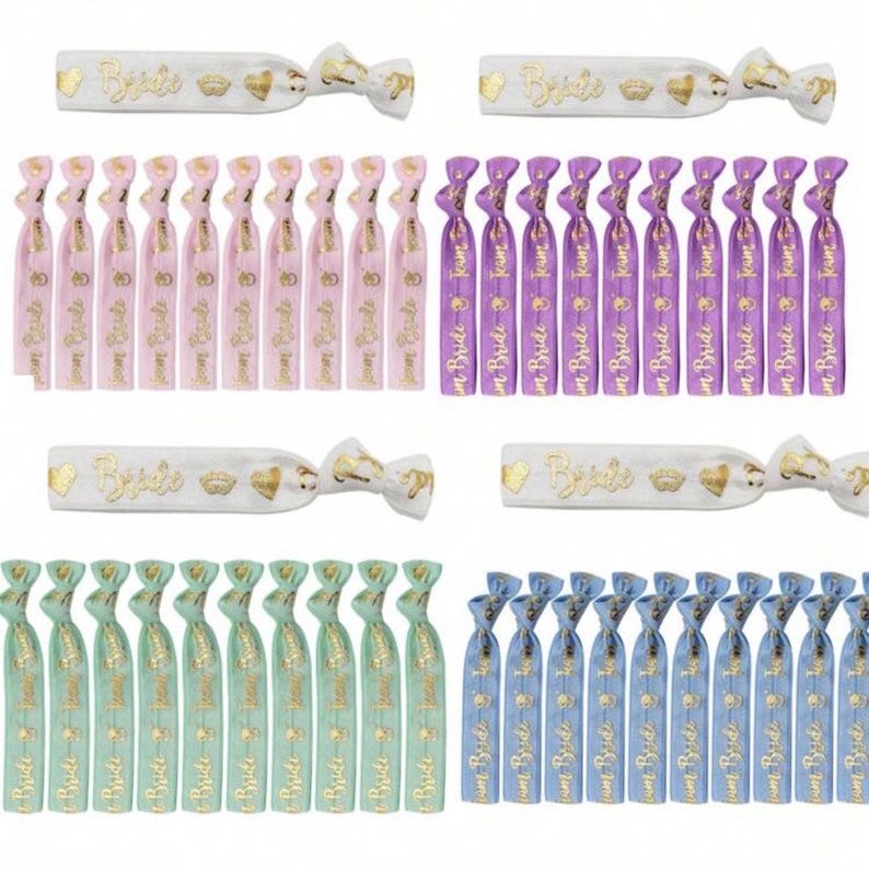 May include: Set of 40 colorful hair ties with gold lettering that says "Bride" or "Team Bride". The hair ties are in four colors: pink, purple, green, and blue.