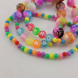 stretch cord bracelets . will make to order and if you need in a different color bead. Fun friendship bracelet .