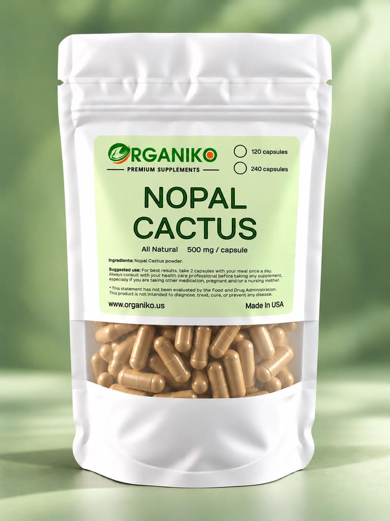 May include: A white stand-up pouch containing light brown capsules. The label reads Organiko Premium Supplements Nopal Cactus, All Natural, 500 mg per capsule, 120 capsules, 240 capsules, ingredients, suggested use, and www.organiko.us.