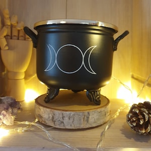 Triple moon metal cauldron for magical preparation