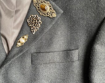 Cluster vintage con 3 spille in finitura oro anticato