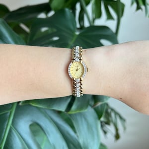 Vintage Elgin Women’s Watch: Gold Shimmer Dial, Crystal Bezel, Heart Details, Gold & Silver Tone