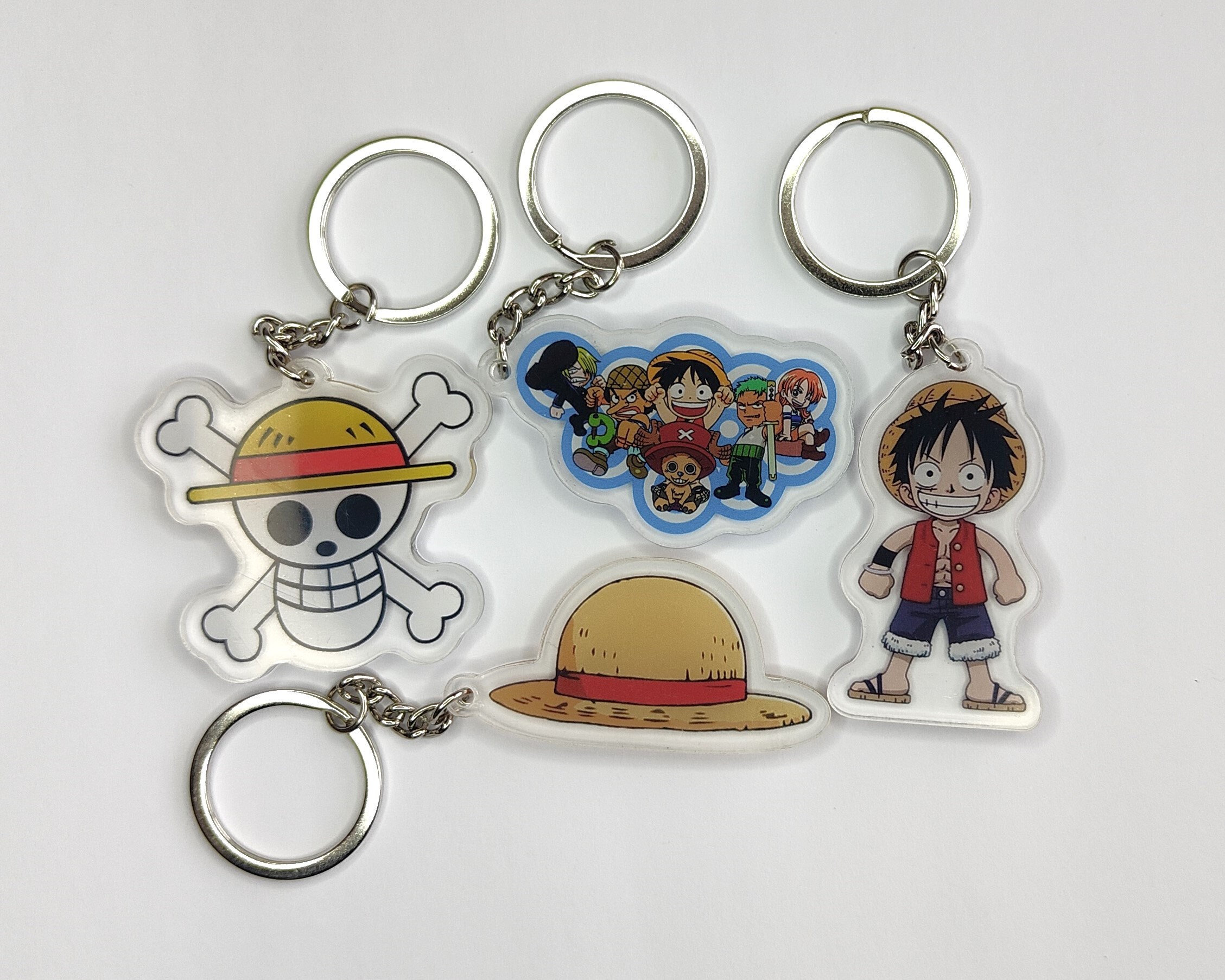 ensemble d'anime Porte-clé Luffy Straw Hat Pirate, Pendentif Manga  Squelette, Accessoire Anime Cosplay, Cadeau Keyring Homme, Etiquette  Personnalisée, Set de Clés Maison, Porte-clé Chat Créatif : : Mode