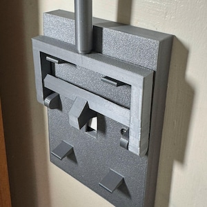 Frankenstein-style UK electric light switch adaptor
