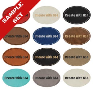 May include: A set of ten oval-shaped leather patches in various colors, each with the text "Create With 614" printed in gold.