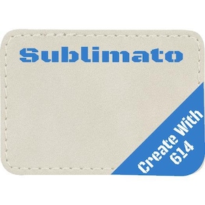 May include: A white leather patch with blue stitching and the text "sublimato" in blue. The bottom right corner has a blue patch with the text "Create Witch 614" in white.