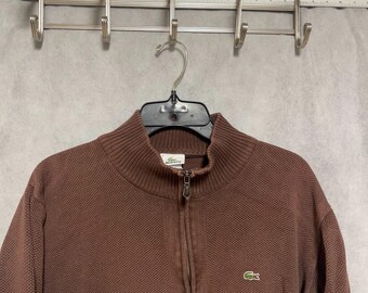 Sudadera Lacoste para hombre, 9 pulgadas, acanalada, con cremallera de 1/4, de tejido grueso y textura suave.