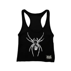May include: Black tank top with a white spider graphic and the text "DECAYED CORPSE" in a black rectangle.