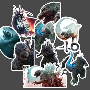 May include: A set of nine stickers featuring different images of Godzilla, a giant monster from Japanese pop culture. The stickers are printed on white paper with a glossy finish. The stickers are perfect for decorating laptops, water bottles, and other surfaces.