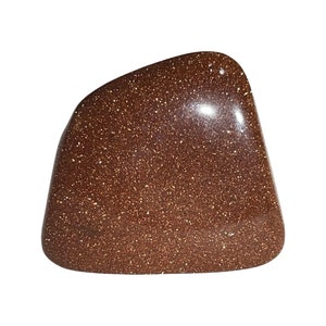 May include: A smooth, brown, polished stone with a glittery texture. The stone is shaped like a rounded rectangle.