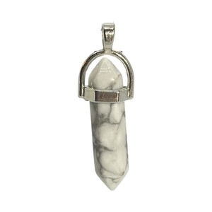 May include: A white howlite crystal pendant with a silver setting. The crystal is a pointed oval shape with a white and grey marbled pattern.