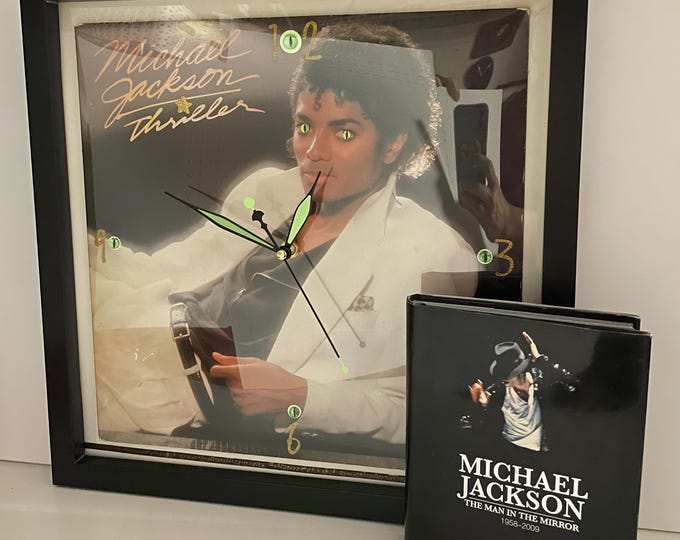 Featured listing image: Michael Jackson – Thriller (ca. 1982) Original Upcycled Record Album Wall Clock – Framed Pop Music Memorabilia + Man In The Mirror Book