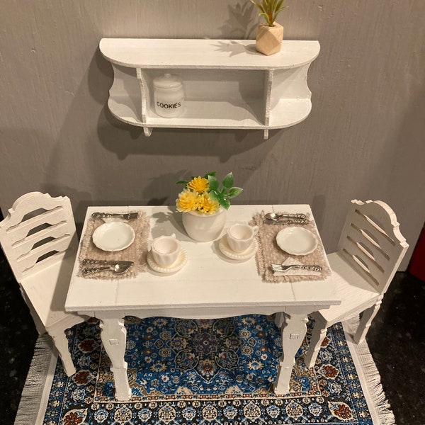 Lovely miniature 1:12th scale kitchen table that comes with two chairs for your dollhouse/room box/shadow box/diorama.