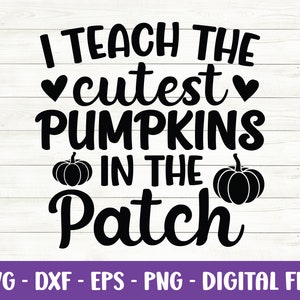 May include: Black and white digital design on a white wood-grain background. The text reads "I teach the cutest pumpkins in the patch" with heart and pumpkin graphics. Includes file types: SVG, DXF, EPS, PNG.