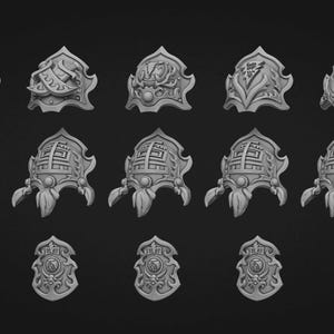 May include: A collection of fifteen grey miniature shoulder armour pieces arranged in three rows. The top row features varied ornate designs, the middle row shows five identical pieces with hanging elements, and the bottom row displays five matching shields.