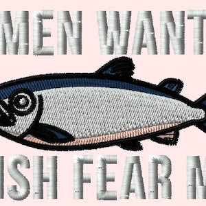 May include: Embroidered patch featuring a stylized fish with a blue and white design, outlined in black. The text "WOMEN WANT ME" is above the fish, and "FISH FEAR ME" is below, all in a textured, gray font.