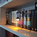 Library Lantern \u2013 Mini Bookshelf Lamp, Fantastic Shelf Decor, Warm and White LED Bookshelf Lamp product logo
