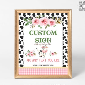 May include: A printable sign with a cow and pink flowers. The sign says "Custom Sign" and "Add any text you like".