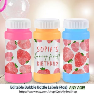 May include: Three 4-ounce bubble bottles with labels featuring a watercolor strawberry pattern. The middle label reads "Sophia's berry first birthday".