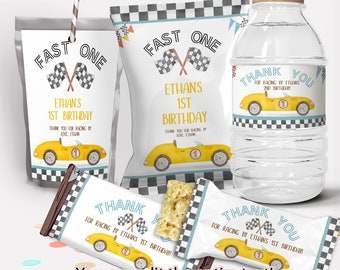 May include: A set of party favour labels featuring a yellow race car with a chequered flag design. The labels say "Fast One" and "Thank You for Racing by Ethan's 1st Birthday".