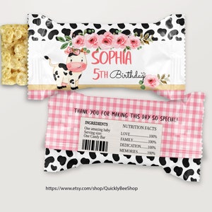 May include: A candy bar wrapper with a cow illustration, pink roses, and the text "SOPHIA 5th Birthday." The wrapper has a black and white cow print design and the text "THANK YOU FOR MAKING THIS DAY SO SPECIAL!"