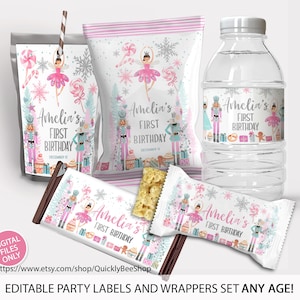 May include: Printable party labels and wrappers featuring a Nutcracker and ballerina theme. The labels are pink, white, and silver with a snowflake design. The text on the labels reads "Amelia's First Birthday".