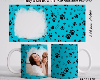 May include: Two white ceramic mugs with a turquoise blue background and black paw print and bone design. The mug on the left has a photo of a woman holding a dog. The mug on the right has the same design but no photo. The text "15 OZ 11 OZ" is at the bottom of the image.