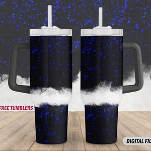 May include: Two black and blue glitter stainless steel tumblers with white lids and black handles.  The tumblers have a white stripe around the middle.  +10 FREE TUMBLERS. DIGITAL FILES.