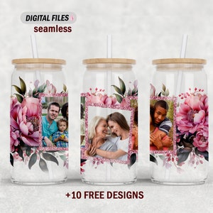 May include: Three clear glass tumblers with pink floral designs and glitter accents. Each tumbler has a straw and a wooden lid. The tumblers feature photos of families.